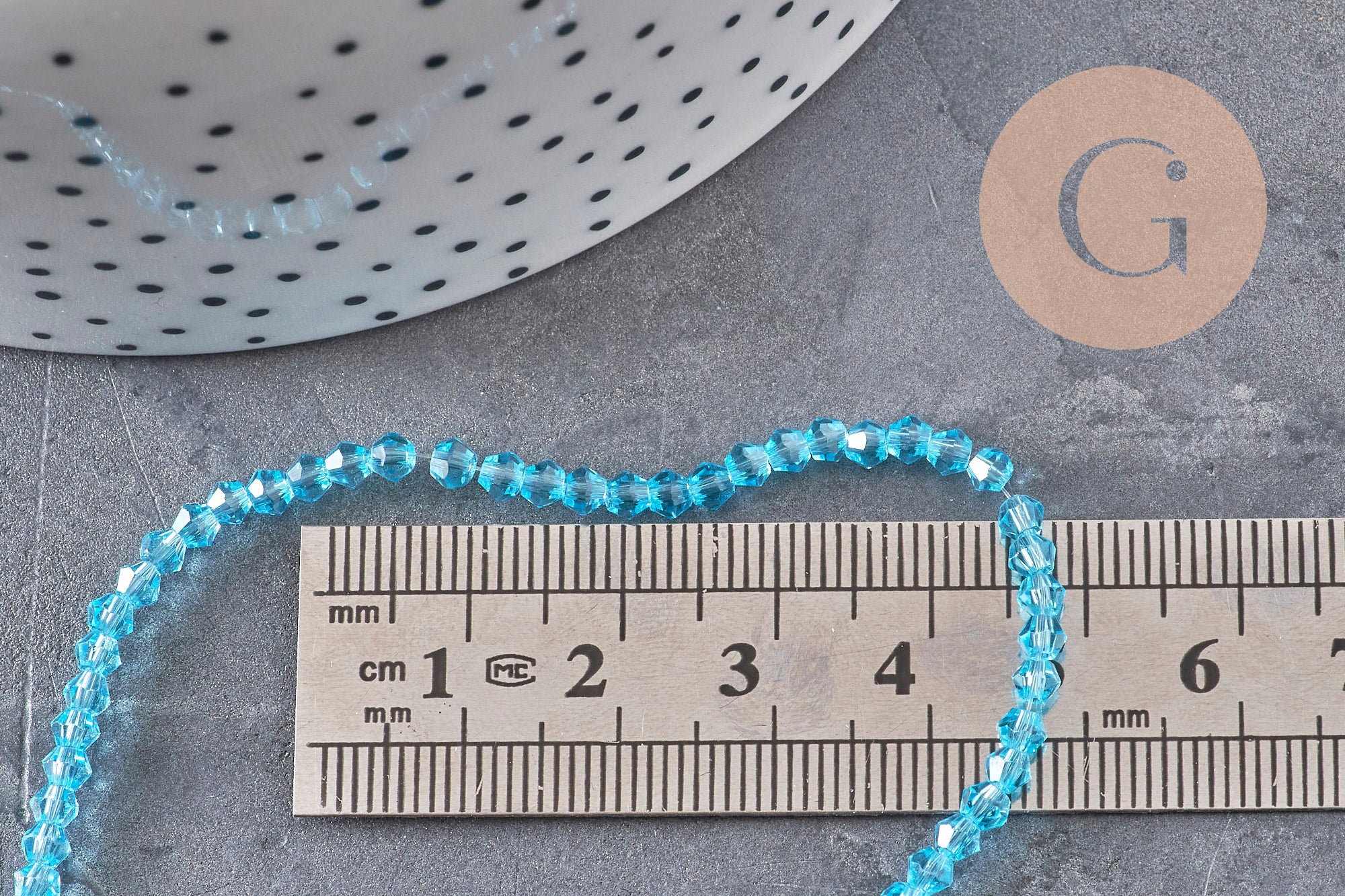 Perles cristal toupies à facette bleu transparent 3-3.3mm, x1 fil de 38cm (G11112)