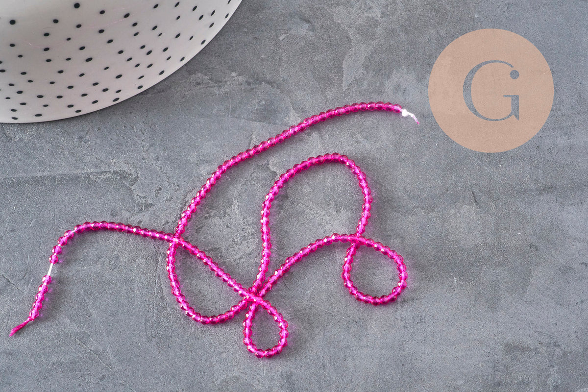 Perles abacus cristal à facette rose fuchsia 2mm, x1 fil de 36cm (G11342)