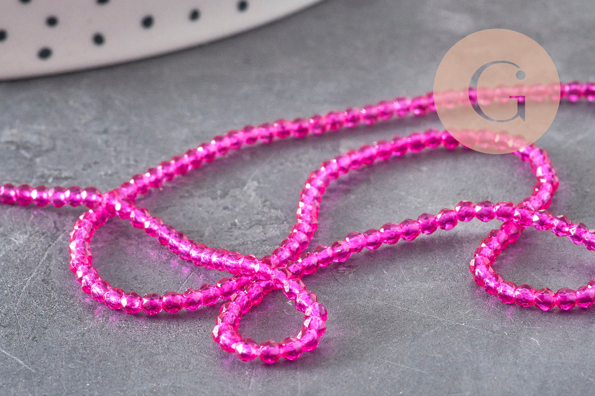 Perles abacus cristal à facette rose fuchsia 2mm, x1 fil de 36cm (G11342)