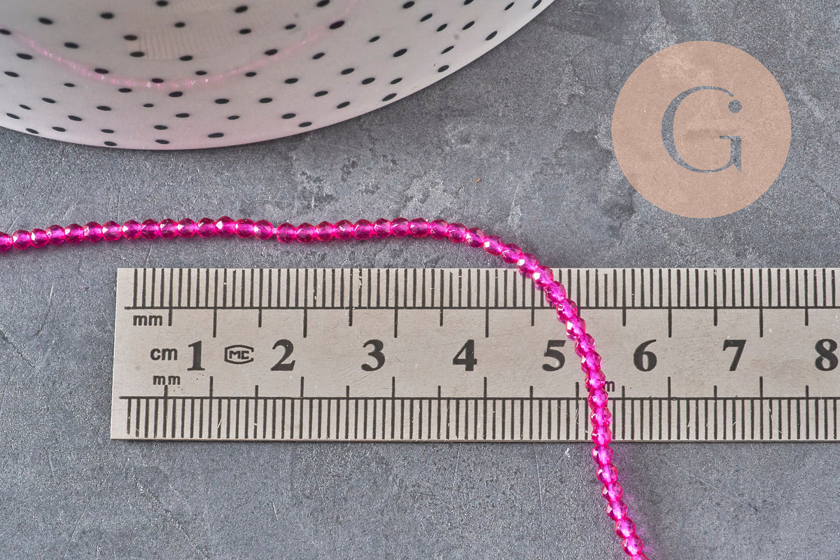 Perles abacus cristal à facette rose fuchsia 2mm, x1 fil de 36cm (G11342)