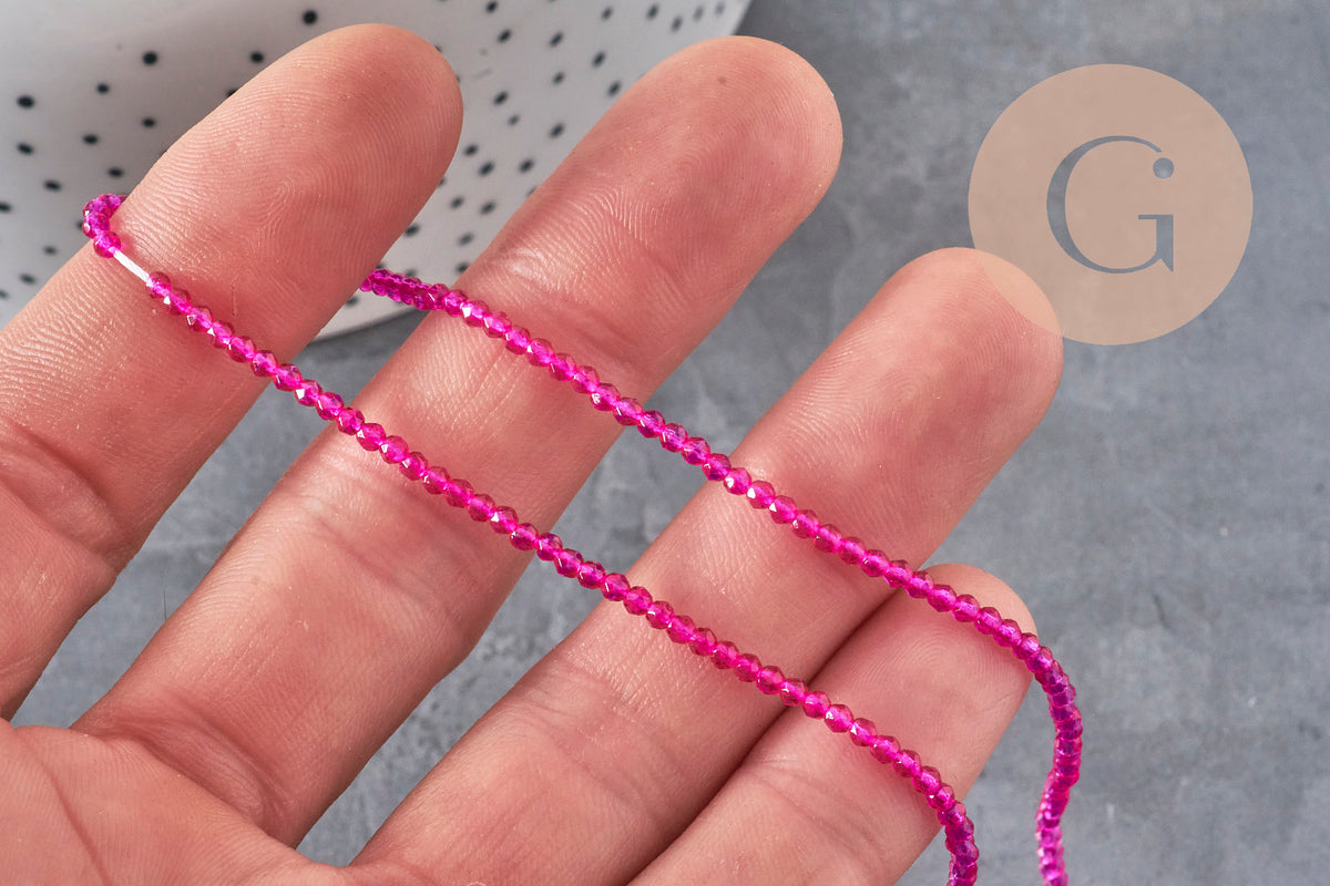 Perles abacus cristal à facette rose fuchsia 2mm, x1 fil de 36cm (G11342)