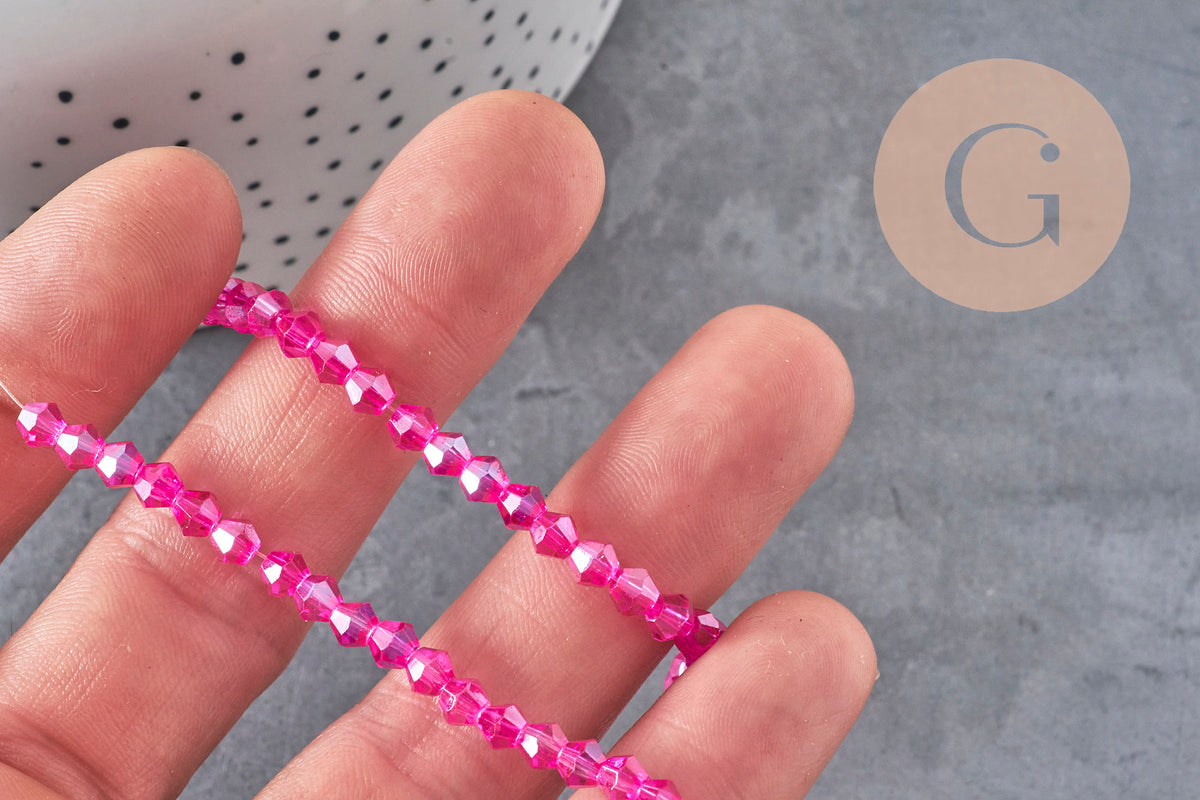 Perles toupies cristal à facette rose fuchsia irisé 4.5mm, x1 fil de 28cm-Perles-Gingerlily Perles
