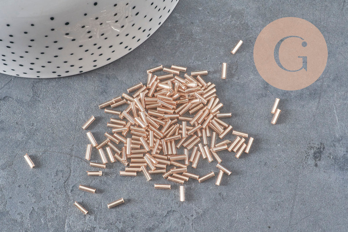 Metallic champagne pink tube seed beads 6-8mm x 1.6mm, x10gr (G2459)