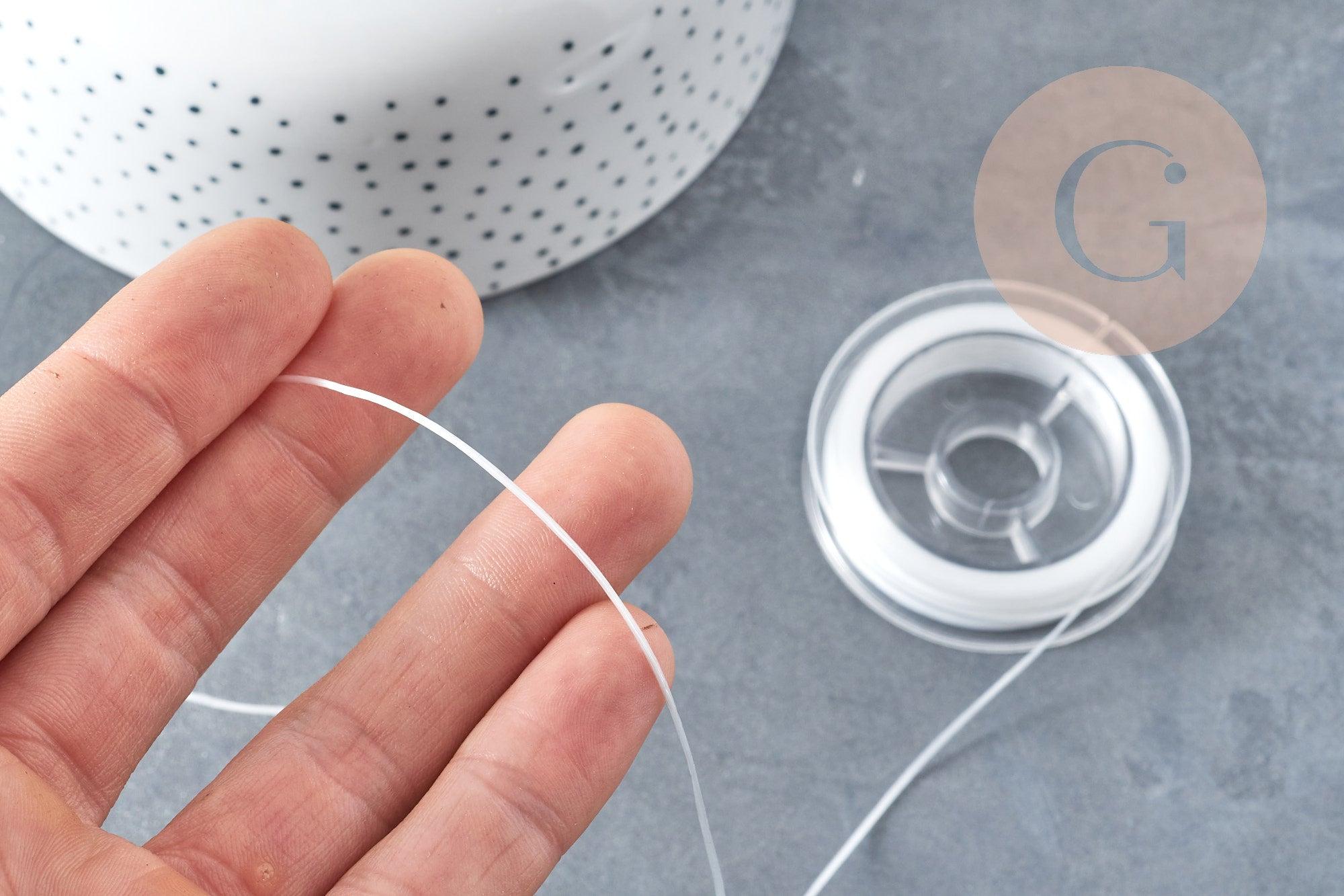 Bobine de 10 mètres de fil élastique nylon blanc 0.8mm, x1 (G8914)