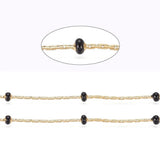 Chaine acier inoxydable doré IP 14 carats fantaisie résine noire 0.5-1.mm, x1 mètre (G5446)