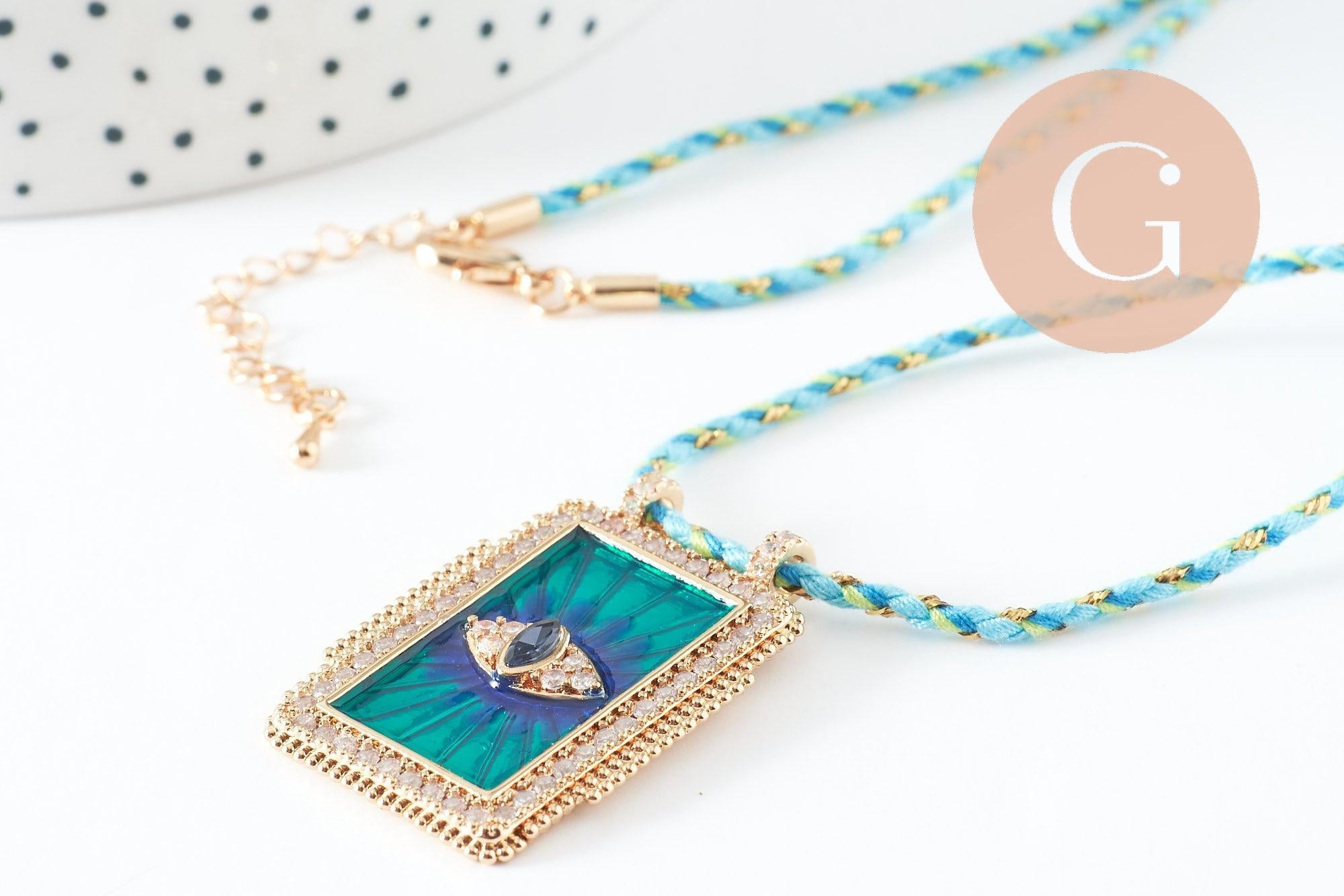 Collier médaille Oeil bleu zircon zamac doré 45cm x1 (G9570)