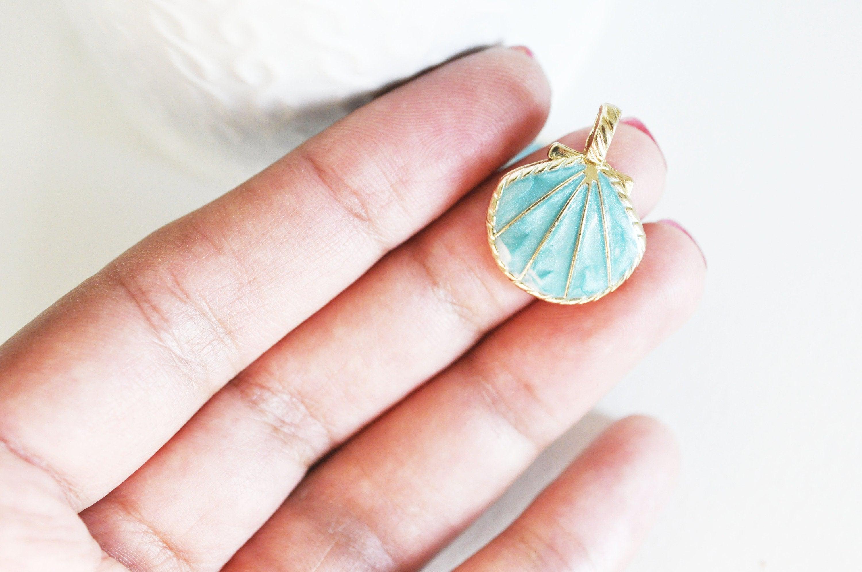 EP Pendentif coquillage doré bleu ciel 24.5mm,x 2,G2958
