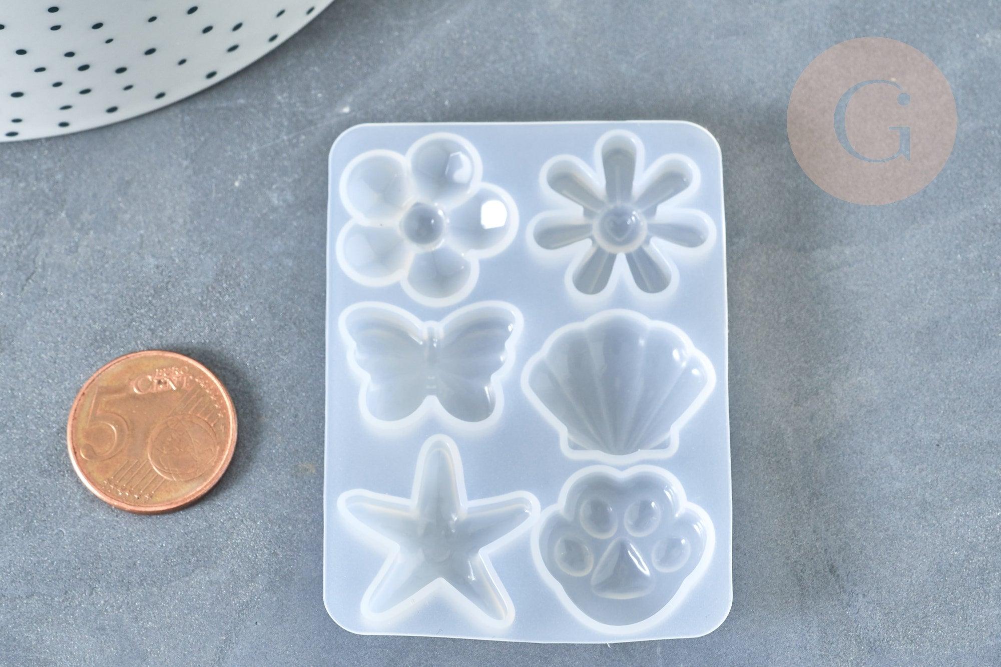 Moule pour fabrication bijoux formes fleurs coquillages résine 67x50x6mm, x1 (G7996)