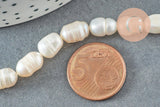 Perle naturelle blanche ovale eau douce 8.5-12mm, perle de culture percée ,fil de 35cm, x1 (G9581)