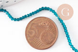 Perle ronde verre facettée transparente bleu turquoise 2mm, x1 fil de 37 cm (G7447)