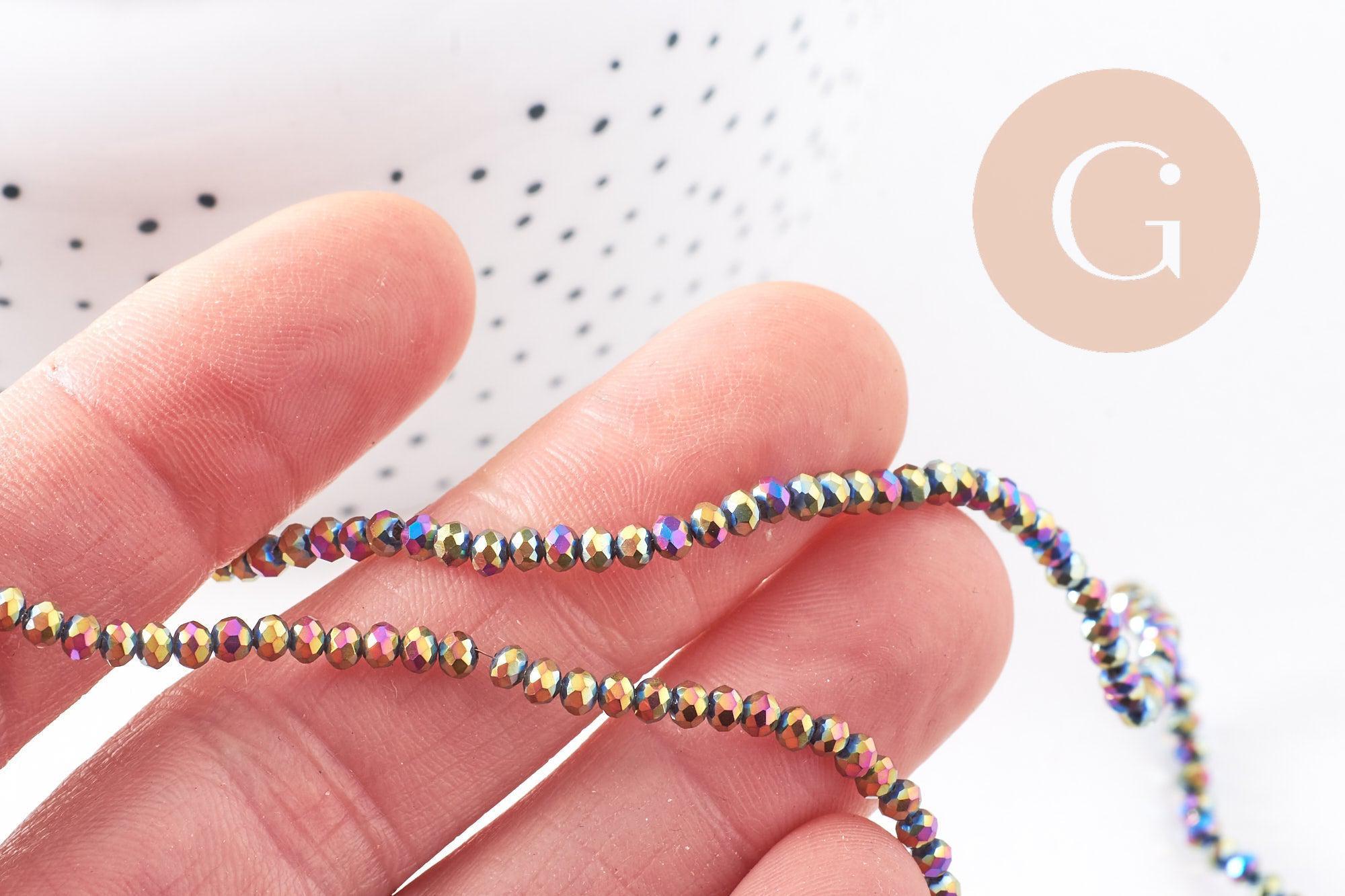 Perles abacus cristal à facette noir irisé 3x2mm, x1 fil de 32cm (G4692)