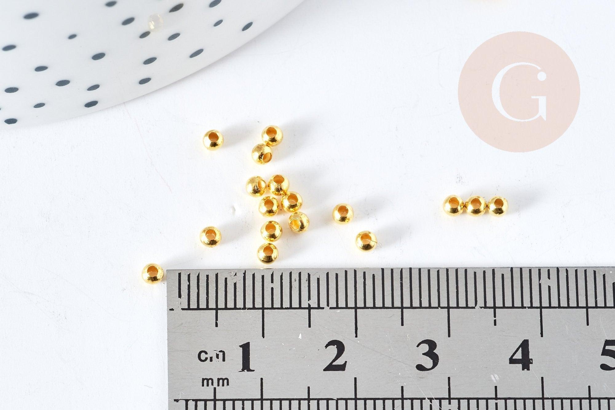 Perles intercalaires rondes laiton doré 2.4mm, x 1Gr (G9841)