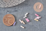 Perles rocaille Tube pastel multicolore 6x2mm, x 10gr (G1651)