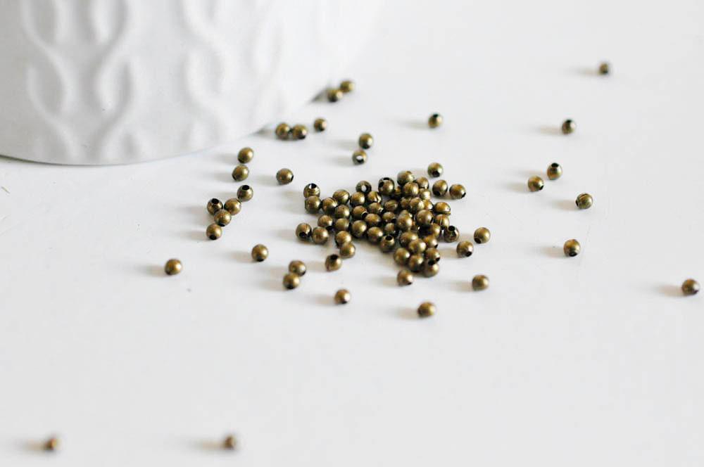 Perles rondes bronze intercalaires 2mm, x10 gr (G5147)
