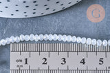 Perles toupies cristal blanc irisé 3.5x2.5mm, fil 25.4cm x1 (G6763)