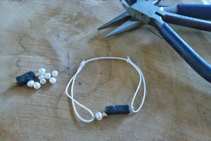 Tie a sliding knot with thread