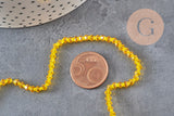 Perles toupies cristal à facette jaune 3.8x3mm, x1 fil de 32.5cm (G11343)