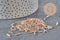Metallic champagne pink tube seed beads 6-8mm x 1.6mm, x10gr (G2459)