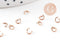 Anneaux ronds acier 304 inoxydable or rose PVD 4mm x0.7mm, x 50 (G10907)