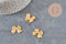 Bow tie pendant raw brass 17mm, x1 (G10167)