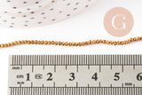 Perle abacus verre facettée doré 2mm, x1 fil de 36cm (G7448)