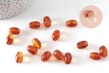 Perle ovale acrylique imitation ambre marron 14mm, x10 (G10998)