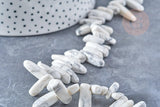 Perle ovale howlite blanche naturelle 13-22mm, x1 le fil 40cm (G8537)