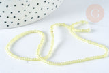 Perle ronde verre facettée transparente jaune clair, 2~2,5mm, fil de 37cm, x1 (G7335)