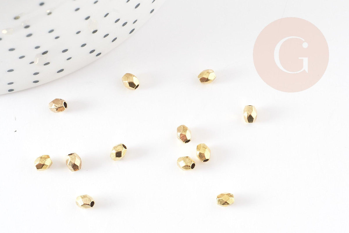 Perles intercalaires facettées zamac doré 4x3.5mm, x50 (6.5gr) (G1547)