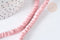 Perles porcelaine heishi rose 6x3~4 mm, bijoux céramique, fil de 48cm, x1 (G7537)
