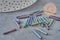 Perles rocaille Tube Verre Noir irisé, Fournitures créative, verre noir métallisé, long tube,20mm x 2mm, x 5gr G0690