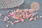 Perles rocaille Tube pastel multicolore 6x2mm, x 10gr (G1651)